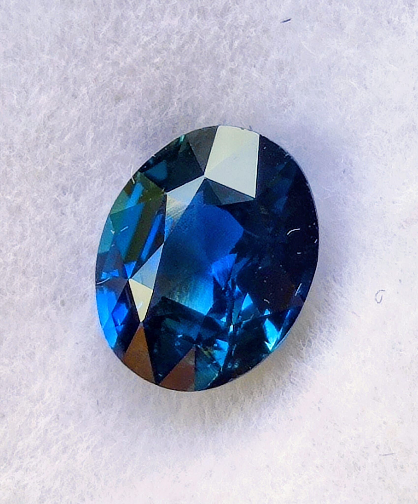 Teal sapphire gemstone